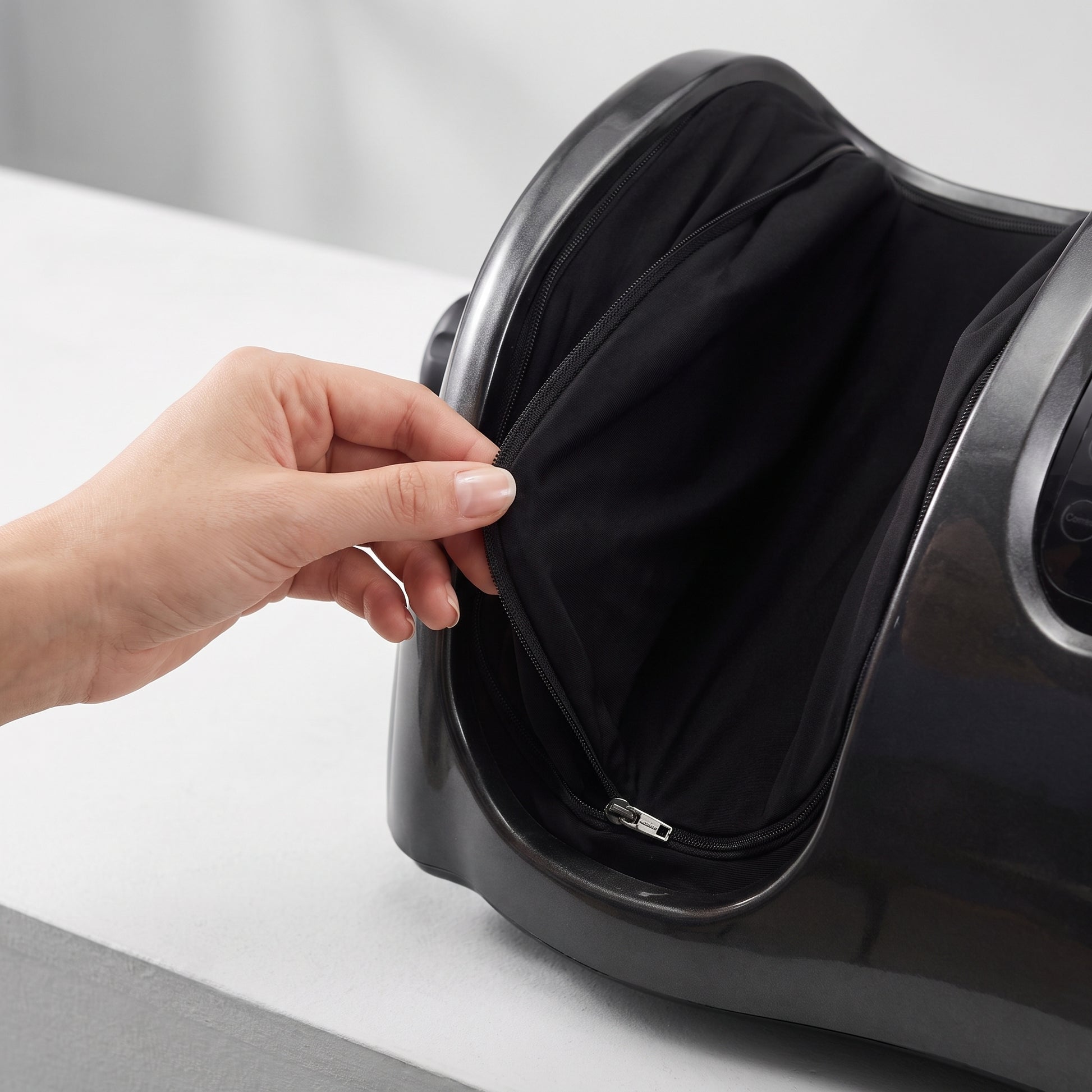 The removable, washable fabric liners of the Velto foot and calf massager