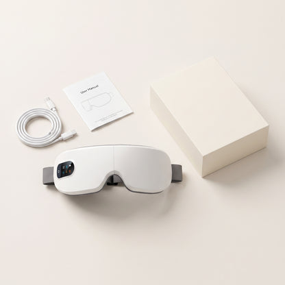 What is included with the Velto Heated Eye Massager — device, USB-C cable, manual and gift box