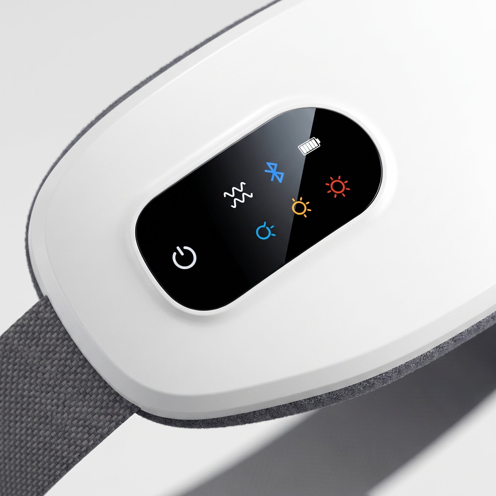 Close-up of the Velto Heated Eye Massager control panel